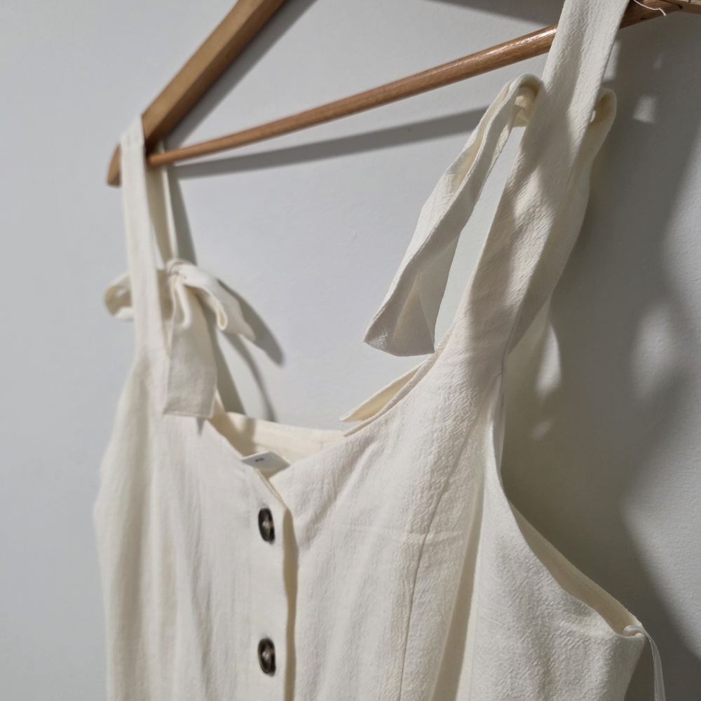 Cream Sleeveless Button-Down Top